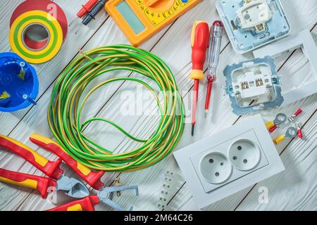 electrical tools set on vintage white painted bopards Stock Photo