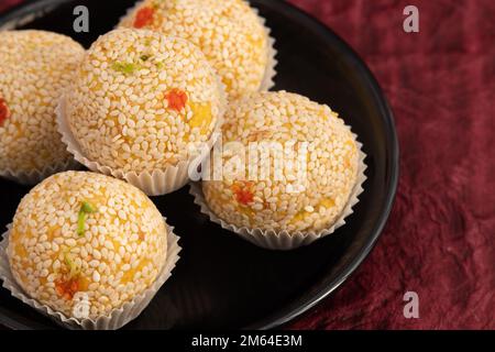 Winter Season Special Traditional Punjabi Mithai Til Bhugga Or Til Bugga Is Made Of Dry Roasted Sesame Seeds With Mava, Khoya, Jaggery, Mawa, Gud, Des Stock Photo