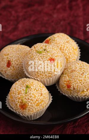 Winter Season Special Traditional Punjabi Mithai Til Bhugga Or Til Bugga Is Made Of Dry Roasted Sesame Seeds With Mava, Khoya, Jaggery, Mawa, Gud, Des Stock Photo