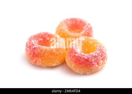 Sweets peach ring gummy candies on white. Stock Photo