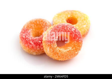 Sweets peach ring gummy candies on white. Stock Photo