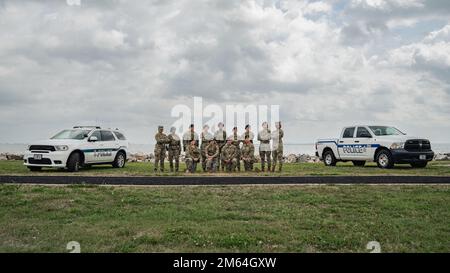 Defenders assigned to the 6th Security Forces Squadron pose for an all-female group photo at MacDill Air Force Base, Florida, March 31, 2022. Women’s History Month is celebrated every March and highlights the achievements and contributions of women in and out of uniform. Stock Photo