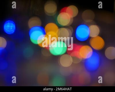 Abstract colourful circles of light defocused from led Christmas lights Stock Photo