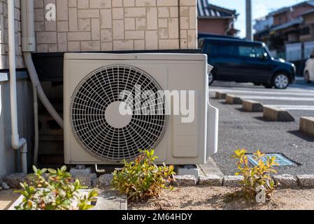 Air conditioner compressor outside the house Stock Photo