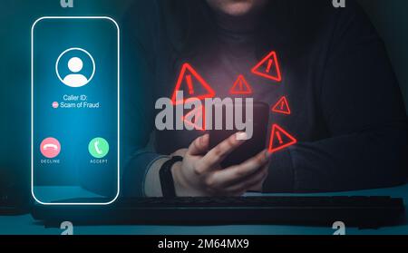 Woman reciving unwanted call on smartphone with red warning icons. Spam, scam, phishing and fraud concept. Security technology. Stock Photo
