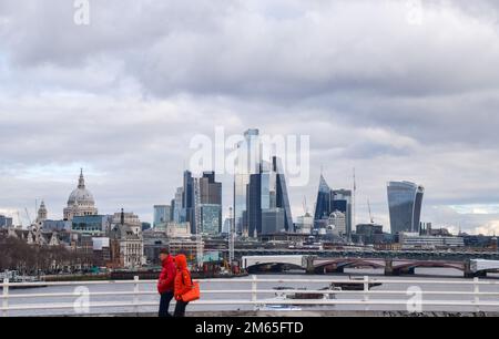 London, UK. 02nd Jan, 2023. People walk along Waterloo Bridge past the City of London skyline, the capital's financial district, as the holiday season comes to an end. (Photo by Vuk Valcic/SOPA Images/Sipa USA) Credit: Sipa USA/Alamy Live News Stock Photo