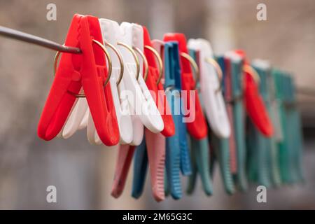 Clothespins and Clothes line on blur background, Stock Photo
