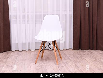 elegant stylish white chair in the room Stock Photo