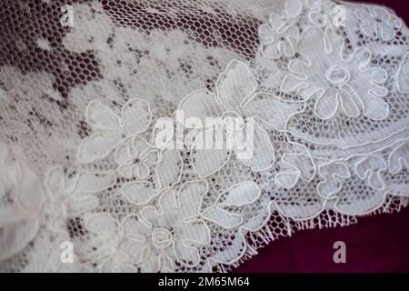 Close up of a lace on a wedding dress. High quality photo.  Stock Photo