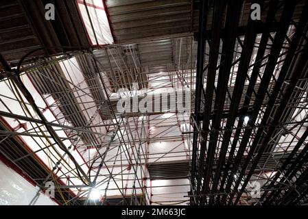 U.S. AIR FORCE ACADEMY, Colo. – A view of the maze of scaffolding inside the Cadet Chapel as repair and restoration work continues on April 5, 2022 at the U.S. Air Force Academy in Colorado Springs, Colo. The chapel closed in early September 2019 and an external 150-foot tall white environmental shelter built to allow for necessary repairs and restoration year-round. (U.S. Air Force photo/Trevor Cokley) Stock Photo