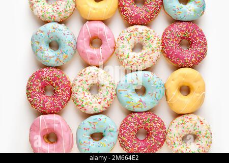 Lots of Color donuts isolated on white background Stock Photo