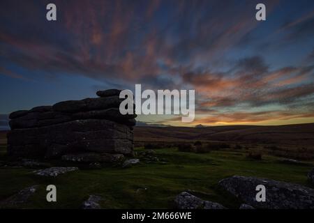 Dartmoor, Devon, UK. 02 Jan 2023. Sunset over Combestone Tor, Dartmoor National Park, Devon.  Credit: Will Tudor/Alamy Live News Stock Photo