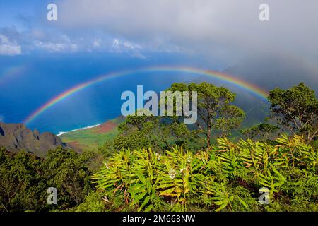 Rainbow over Kalalau Valley on Kauai Stock Photo