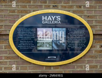 An informational sign about The Pool of London and Hay's Wharf, now Hay's Galleria. Stock Photo