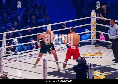 11-28-2015 Dusseldorf, Germany. Tyson Fury hides his hands behind his back, trying to prove his excellent defensive abilities to the enemy (Klitschko) Stock Photo