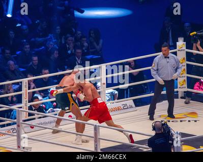 11-28-2015  Dusseldorf , Germany. Wladimir Klitschko tries to deliver a powerful blow and misses: the opponent   (Fury) dodged and crouched Stock Photo