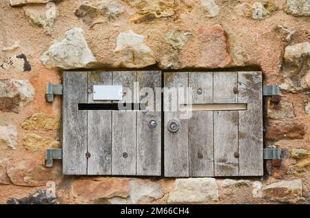 Old wood postbox. Stock Photo