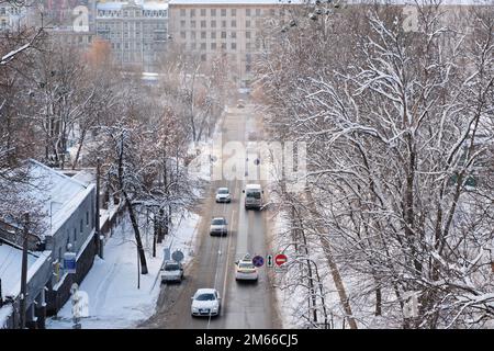 KYIV. UKRAINE - January 15, 2021: Busy Kyiv street, sunny winter day, Ukraine Stock Photo