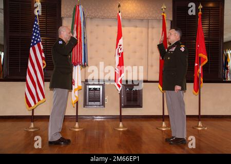 Lt. Gen. Scott A. Spellmon, 55th chief of engineers and U.S. Army Corps of Engineers commanding general, administers the Oath of Office to Maj. Gen. Thomas J. Tickner, USACE North Atlantic Division commander and division general, during Tickner's promotion ceremony held April 7 at the Fort Hamilton Community Club. Stock Photo