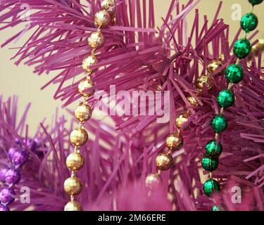 Mardi Gras Christmas tree decorated with purple (justice), green