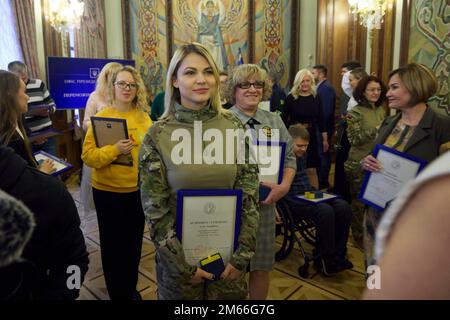 Kyiv, Ukraine. 30 December, 2022. Ukrainian volunteers pose with their Golden Heart awards following a ceremony at the Mariinsky Palace, December 30, 2022 in Kyiv, Ukraine.  Credit: Ukraine Presidency/Ukraine Presidency/Alamy Live News Stock Photo