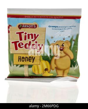 Winneconne, WI - 5 December 2022: A package of Arnotts tiny teddy honey on an isolated background. Stock Photo