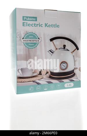 Winneconne, WI - 5 December 2022: A package of Pulomc electric kettle on an isolated background. Stock Photo