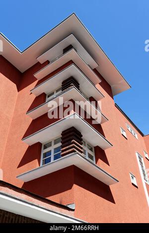 corner windows on rental house from the 30s in cologne Stock Photo