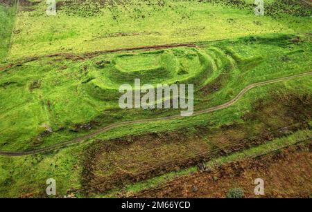 Dun Nosebridge multivalate prehistoric Iron Age fort hillfort above the River Laggan, Islay, Inner Hebrides, Scotland. Aerial. Looking S.E. Stock Photo