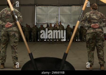 Soldiers assigned to the Field Support Command, 2nd Battalion, 34th Armored Regiment, 1st Armored Brigade Combat Team, 1st Infantry Division, stand at parade rest during a change of command ceremony at Drawsko Pomorskie, Poland, April 8, 2022. Stock Photo