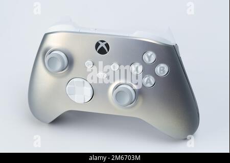 New york, USA - December 28, 2022: Silver xbox series x controller perspective view isolated on studio background Stock Photo