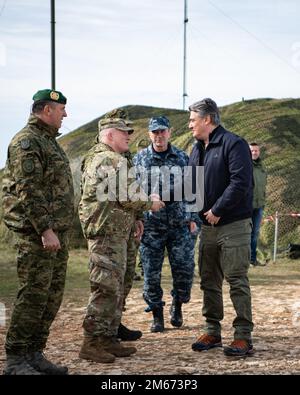 Brig. Gen. Joseph Hilbert, the Commanding General of 7th Army Training Command, meets Croatian President Zoran Milanović before an air defense live-fire exercise conducted by paratroopers with the 173rd Airborne Brigade and soldiers with the Croatian Air Defense Regiment. This training is part of Exercise Shield 22 at Kamenjak near Medulin, Croatia on April 9, 2022.    Exercise Shield 22 is an annual Croatian air defense exercise that aims at strengthening the execution of the Air Defense tasks against low and medium altitude moving targets. During the exercise, the 173rd Airborne Brigade and Stock Photo