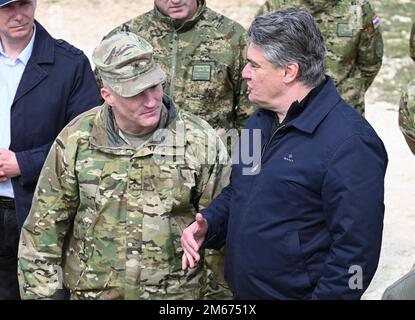 U.S. Army Brig. Gen. Joseph Hilbert, Commanding General of 7th Army Training Command and Croatian President Zoran Milanović discuss the outcome of a live fire exercise as part of Exercise Shield 22, April 9, 2022 near Pula, Croatia. Exercise Shield is an annual Croatian air defense exercise that aims at strengthening the execution of the Air Defense tasks against low and medium altitude  moving targets. During the exercise, the 173rd Airborne Brigade and Croatian Air Defense Regiment jointly trained on Air Defense Tactics, Techniques and Procedures to include air-space control, deconfliction a Stock Photo