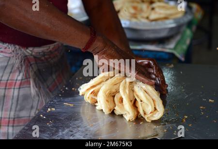 Roti / Paratha bread prepared in a small restaurant in Madurai, Tamil ...
