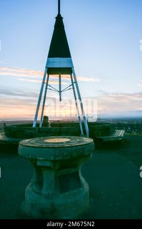 Trig structure on top of Mount Eden at sunrise in Auckland New Zealand. Stock Photo