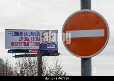 Olomouc, Czech Republic. 31st Dec, 2022. Election billboard for presidential candidate Danuse Nerudova and one way road sign placed on the street of Olomouc. First round of presidential elections in the Czech Republic will be held on 13th and 14th of January 2023. As per current election surveys candidates with the highest chance to make it to second round of elections are Petr Pavel, Danuse Nerudova and former prime minister Andrej Babis. (Credit Image: © Tomas Tkacik/SOPA Images via ZUMA Press Wire) Stock Photo