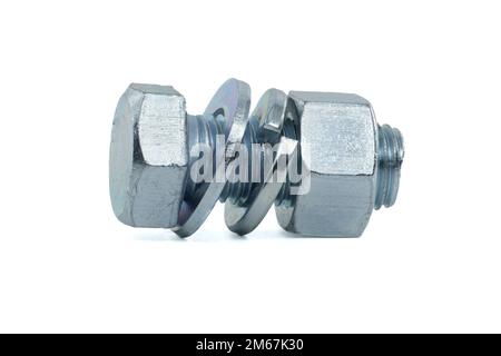 Full thread hexagon bolt and internal screw, flat nut washer and spring washer coated with a protective layer of zinc isolated on white background Stock Photo