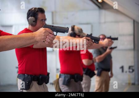 ICE Enforcement and Removal Operations (ERO) firearms instructors take aim at their targets during a training session at the Federal Law Enforcement Training Center (FLETC) in Glencoe, Georgia on April 12, 2022. Stock Photo