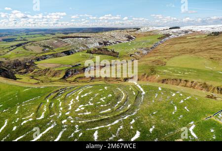 Castle Hill camp, a prehistoric Iron Age multivallate hill fort near Alnham in south side of the Cheviot Hills, Northumberland. Looking S.W. Stock Photo