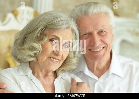 happy nice Senior couple posing at home Stock Photo