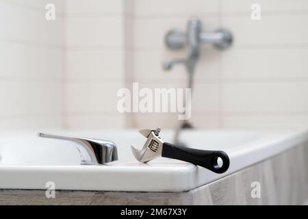 Leaking shower faucet. Broken bathtub handle. Emergency repair Stock