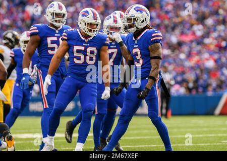 Chicago, United States. 24th Dec, 2022. Buffalo Bills safety Damar Hamlin  (3) celebrates a fumble recovery by teammate Tim Settle during the Bills  35-13 Christmas Eve win over the Chicago Bears at