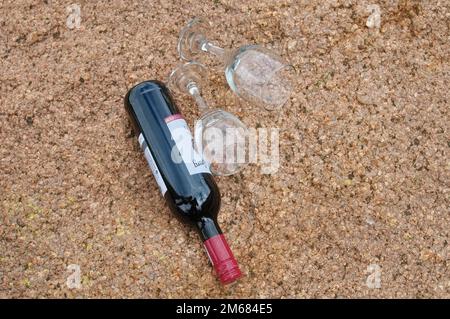 glass of wine held over moutain Stock Photo