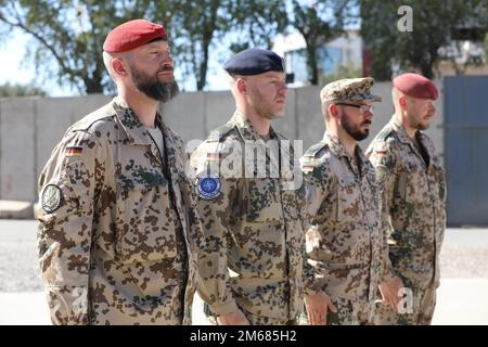 Soldiers of the German Bundeswehr stand at attention in their dress ...