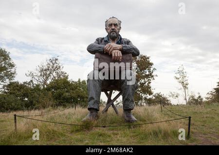 A sculture by Sean Henry, Seated Figure 2016, at the Yorkshire Sculpture Park Stock Photo