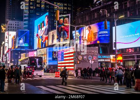 Broadway with traffic and advertising hoardings near Times Square at night, New York City, USA Stock Photo