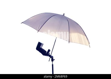 Umbrella and flash for the camera, isolated on a white background Stock Photo