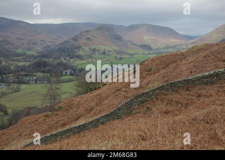 Helm Crag near Grasmere shown from Grey Crag, the descent from Alcock Tarn Stock Photo