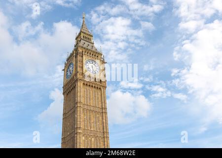 Elizabeth tower the popular Big Ben the largest clock tower in the world with a belfry, a landmark of London, England, low angle shot. Stock Photo