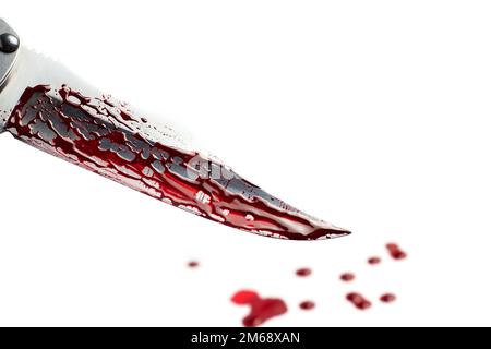 Drops of blood from a murder knife on white background Stock Photo